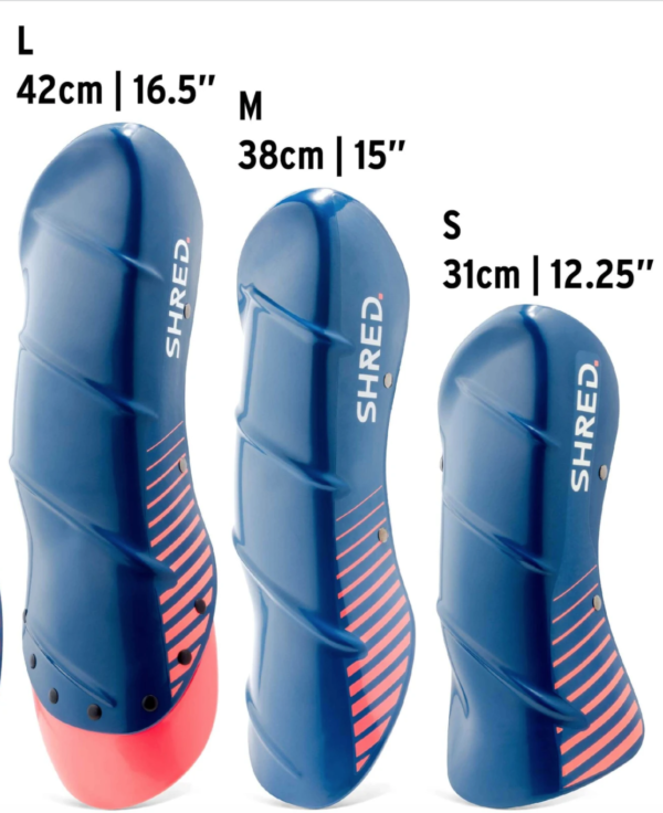 Shred shinguards in navy blue/rust on World Cup Ski Shop 4