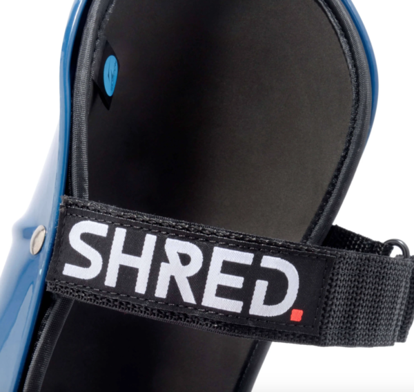 Shred shinguards in navy blue/rust on World Cup Ski Shop 5